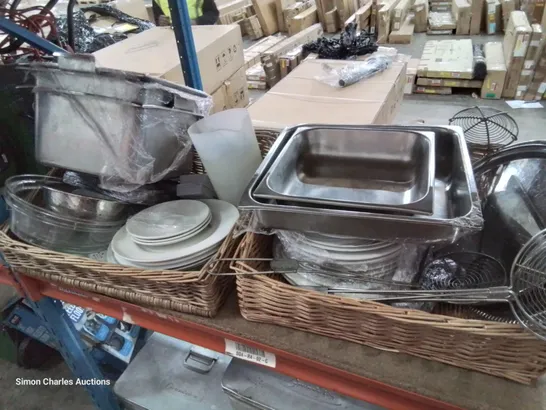 TWO WICKER BREAD BASKETS CONTAINING ASSORTED CATERING ITEMS, INCLUDING PLATTERS, TRAYS, CROCKERY, WIRE STRAINERS.