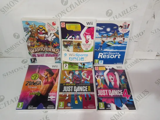 NINTENDO WII GAMES CONSOLE W. ASSORTMENT OF GAMES TO INCLUDE WARIO LAND THE SHAKE DIMENSION, JUST DANCE 3, ETC