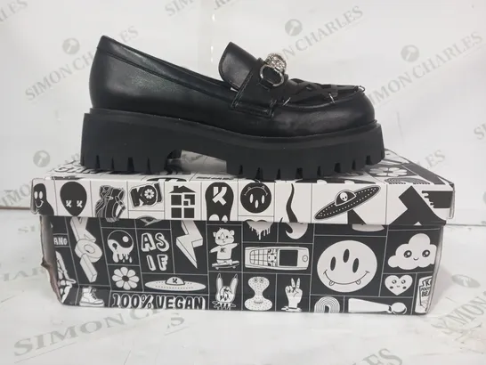 BOXED PAIR OF KOI PLATFORM SLIP-ON SHOES IN BLACK W. PENTAGRAM & SILVER EFFECT OWL DESIGN SIZE 4