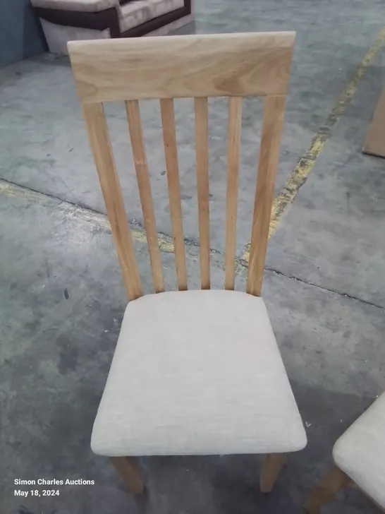 A BOXED PAIR OF NEW CONSTANCE DINING ROOM CHAIRS IN NATURAL COLOUR