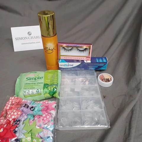 APPROXIMATELY 20 ASSORTED COSMETIC PRODUCTS TO INCLUDE ORANURSE TOOTHPASTE, SIMPLE CLEANSING WIPES, AND TATTI LASHES