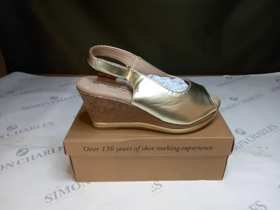 BOXED PAIR OF CUSHION WALK GOLD WEDGE HEEL SHOES IN GOLD - SIZE 5