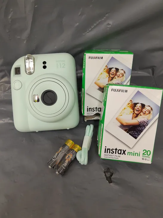 BOXED FUJIFILM INSTAX MINI 12 ISTANT CAMERA RRP £109.99