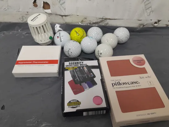 APPROXIMATELY 12 ASSORTED HOUSEHOLD ITEMS TO INCLUDE GOLFBALLS, HONEYWELL T100 SERIES RADIATOR KNOB, SECURITY CREDIT CARD WALLET, ETC