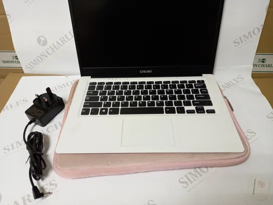 CHUWI WHITE, LAPTOP WITH PINK CASE APPROX. 13.7" SCREEN