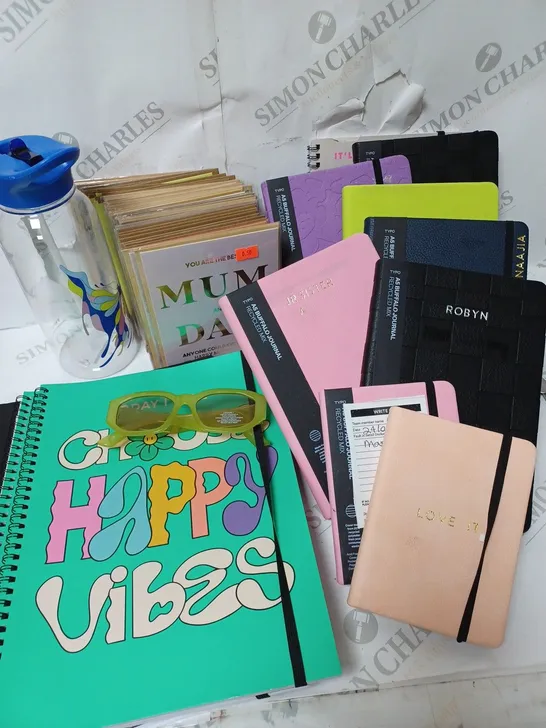 APPROXIMATELY 7 COTTON ON ITEMS INCLUDING 7 A5 AND 4 A4 NOTYEBOOKS AND PLANNERS, CARDS FOR SEVERAL OCCASIONS, SUNGLASSES AND LARGE WATER BOTTLE