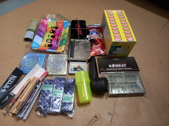 LOT OF ASSORTED SMOKING ACCESSORIES TO INCLUDE RIZZLAS, FILTERS AND MATCHES