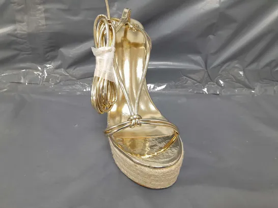 PAIR OF PRETTY LITTLE THING OPEN TOE PLATFORM HIGH WEDGE SANDALS IN METALLIC GOLD SIZE 3