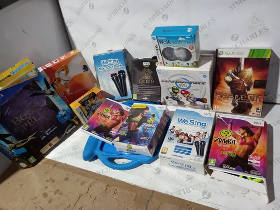 13 ASSORTED ITEMS TO INCLUDE: FABLE 3 FOR XBOX 360, WESING MIKRO 2ER PACK, BOOK OF SPELLS FOR PS3, WII SING, MARIO KART FOR WII ETC