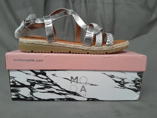 BOXED PAIR OF MODA IN PELLE PLAITED DETAIL FLAT OPEN TOE SANDALS IN METALLIC SILVER EU SIZE 37