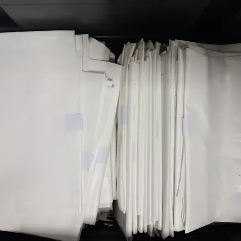APPROXIMATELY 80 ASSORTED POSTAGE BAGS IN WHITE