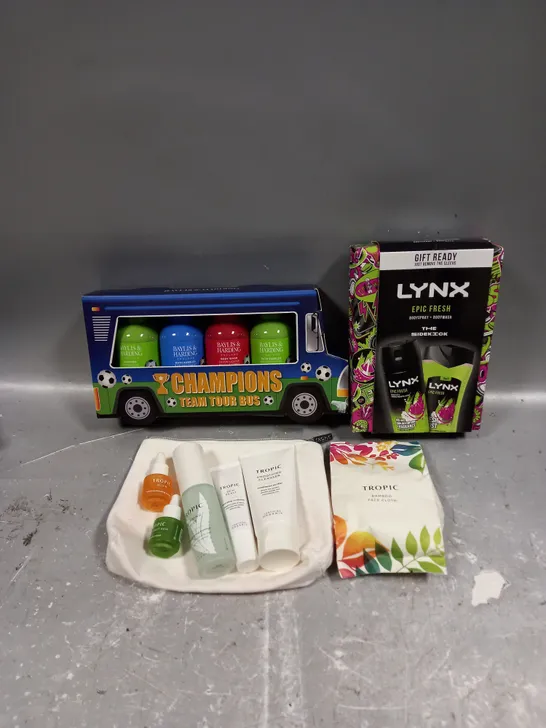 LOT OF 3 ASSORTED COSMETIC BOXSETS TO INCLUDE - LYNX EPIC FRESH BODY COLLECTION - BAYLIS & HARDING CHAMPIONS BODY COLLECTION - TROPIC SKINCARE COLLECTION