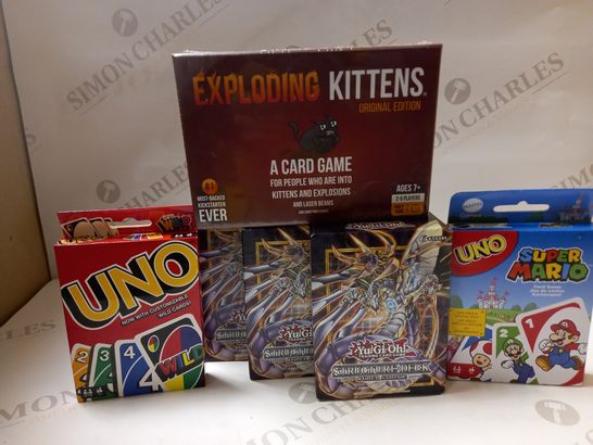 LOT OF ASSORTED CARD GAMES TO INCLUDE YU GI OH STRUCTURED DECK CYBER STRIKE, UNO CLASSIC, SUPER MARIO UNO, EXPLODING KITTENS 