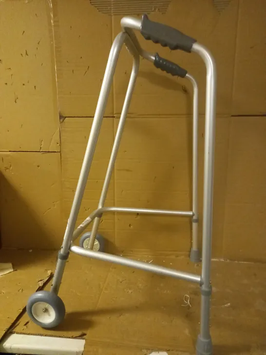 NRS HEALTHCARE WALKING FRAME (WHEELED)