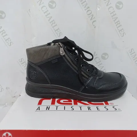 BOXED PAIR OF RIEKER WATER RESISTANT BOOTS IN BLACK SIZE 7.5 
