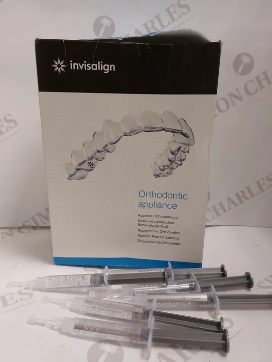 BOX OF APPROX 6 ITEMS TO INCLUDE INVISALIGN ORTHODONTIC APPLIANCE AND TEETH WHITENING LIQUID