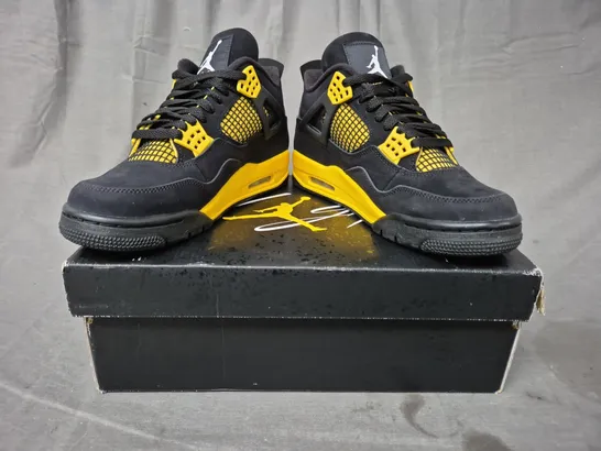 BOXED PAIR OF NIKE AIR JORDAN 4 RETRO SHOES IN BLACK/YELLOW UK SIZE 6