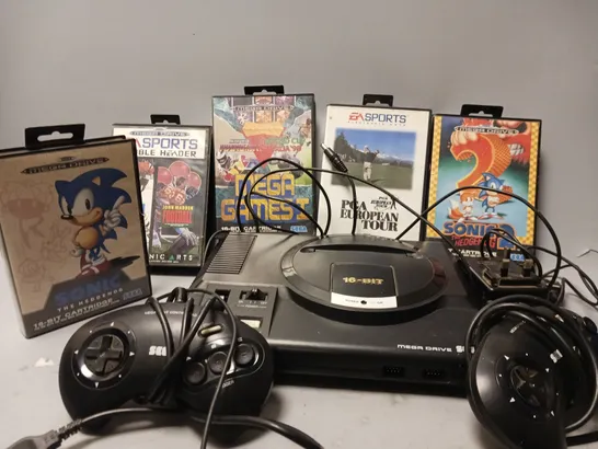 SEGA MEGADRIVE WITH TWO CONTROLLERS AND 5 GAMES