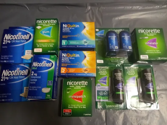 LOT OF ASSORTED QUITTING SMOKING AIDS TO INCLUDE NICORETTE AND NIQUITIN