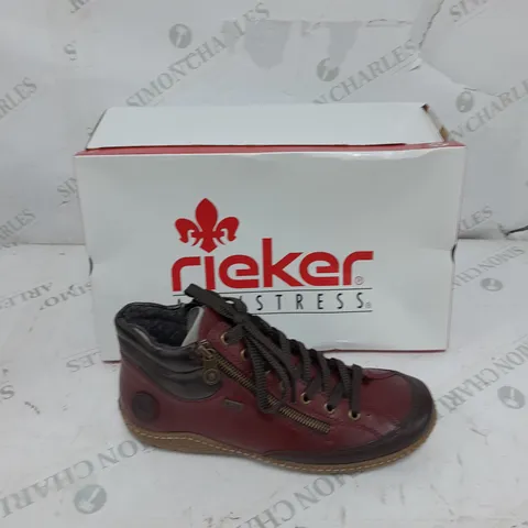 BOXED PAIR OF RIEKER SIDE ZIP WATER RESISTANT BOOTS IN BURGUNDY SIZE 6