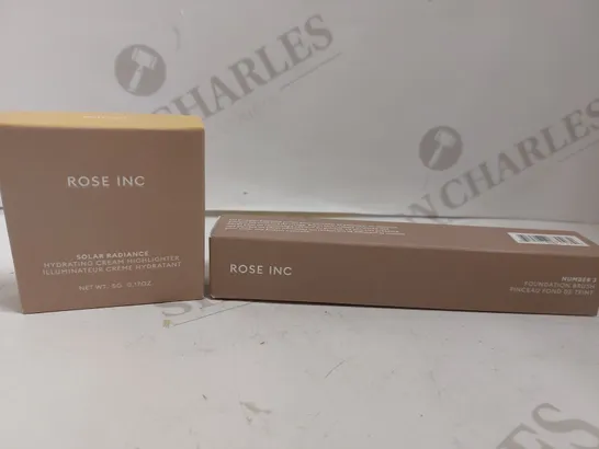 BOX OF 2 ROSE INC. ITEMS TO INCLUDE FOUNDATION BRUSH AND CREAM HIGHLIGHTER