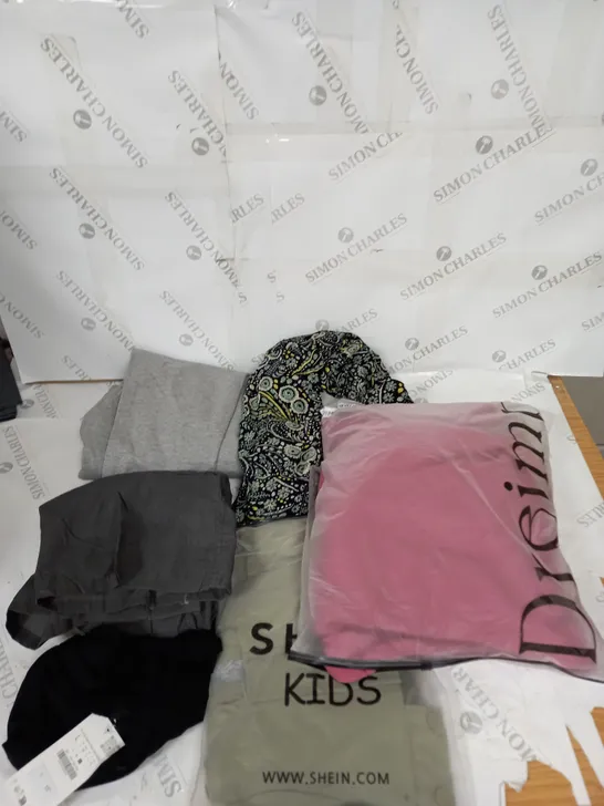 LARGE BOX OF ASSORTED CLOTHING ITEMS IN VARIOUS COLOURS AND SIZES INCLUDING TROUSERS , TOPS AND JUMPERS 