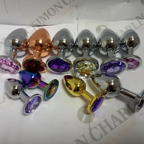 LOT OF APPROX 10 ASSORTED METAL ANAL PLUGS OF VARIOUS COLOURS AND SIZES