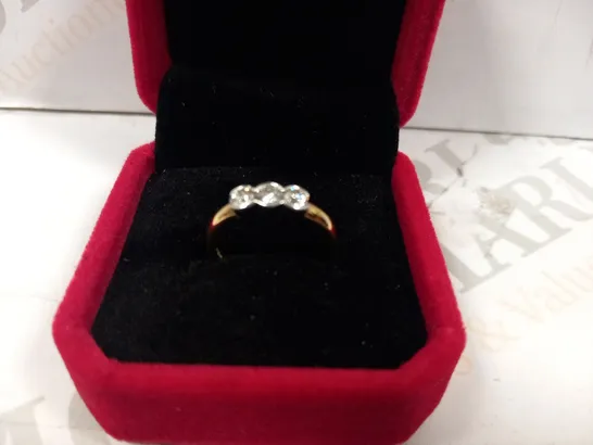 18CT GOLD THREE STONE RING RUB OVER SET WITH DIAMONDS