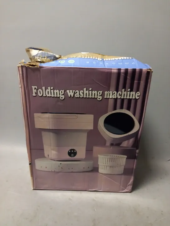 BOXED UNBRANDED FOLDING WASHING MACHINE 