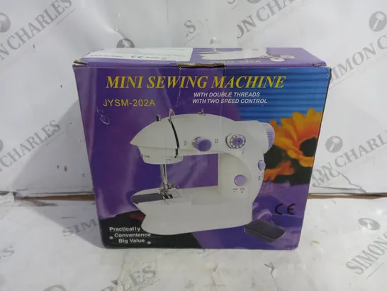 BOXED UNBRANDED MINI SEWING MACHINE JYSM-202A