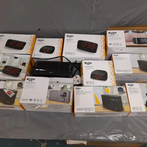 BOX OF APPROXIMATELY 10 ASSORTED AUDIO ITEMS BY BUSH TO INCLUDE CLOCK RADIO, PORTABLE DAB RADIO, AND LARGE ALARM CLOCK RADIO ETC. 