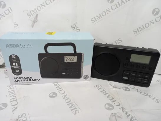 BOXED PORTABLE AM/FM RADIO IN BLACK