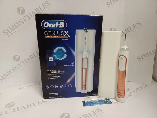 BOXED ORAL-B GENIUS X ROSE GOLD ELECTRIC TOOTHBRUSH DESIGNED BY BRAUN 