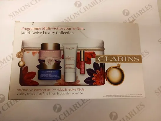 BOXED CLARINS PARIS MULTI ACTIVE LUXURY COLLECTION