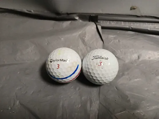 APPROXIMATELY 60 ASSORTED GOLF BALLS TO INCLUDE TITLEIST, TAYLOR MADE