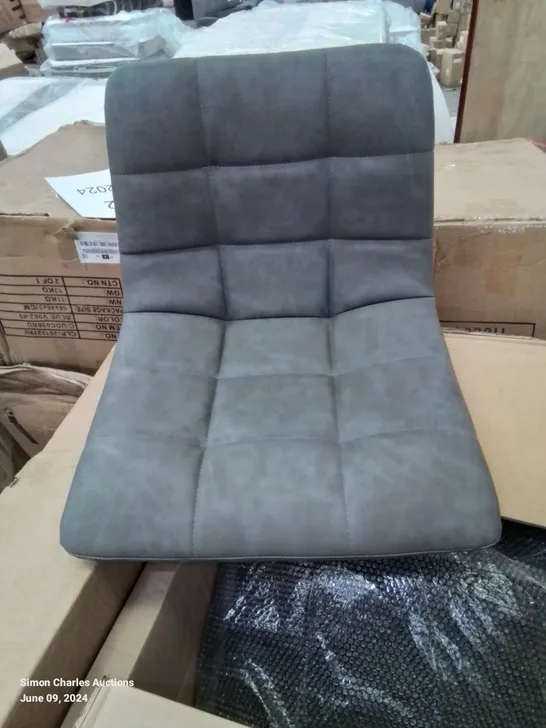 A BOXED PAIR OF GREY FAUX LEATHER UPHOLSTERED DINING CHAIRS