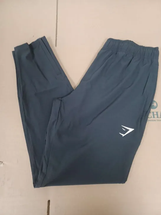 GYMSHARK ARRIVAL WOVEN JOGGERS IN BLACK - SMALL