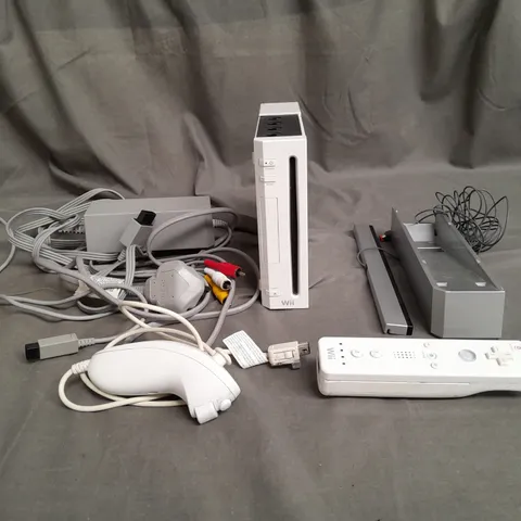 NINTENDO WII CONSOLE IN WHITE WITH ACCESSORIESM WIRES, AND CONTROLLER