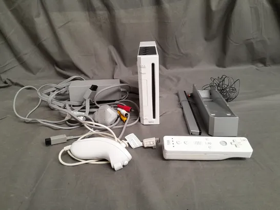 NINTENDO WII CONSOLE IN WHITE WITH ACCESSORIESM WIRES, AND CONTROLLER