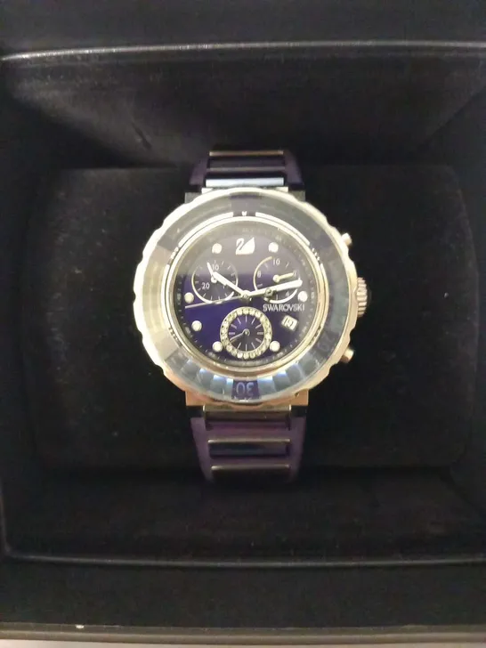 SWAROVSKI 1088675 STAINLESS STEEL 50M SWISS MADE WRIST WATCH AND PURPLE RUBBER STRAP 