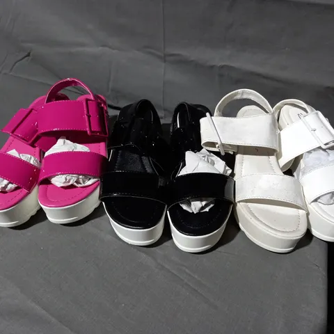 APPROXIMATELY 11 BOXED PAIRS OF DOLCIS PLATFORM SANDALS IN BLACK, PINK, WHITE VARIOUS SIZES TO INCLUDE SIZES 3, 4, 5