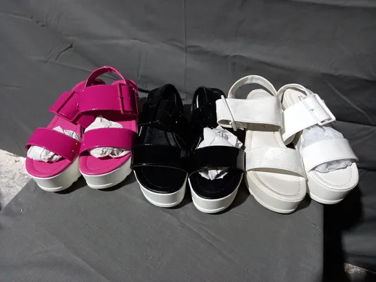 APPROXIMATELY 11 BOXED PAIRS OF DOLCIS PLATFORM SANDALS IN BLACK, PINK, WHITE VARIOUS SIZES TO INCLUDE SIZES 3, 4, 5