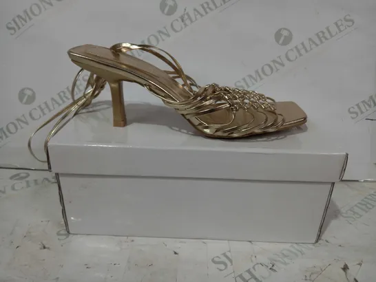 BOXED PAIR OF WAREHOUSE KNOTTED STRAPPY LOW HEEL SANDALS IN METALLIC GOLD EU SIZE 38