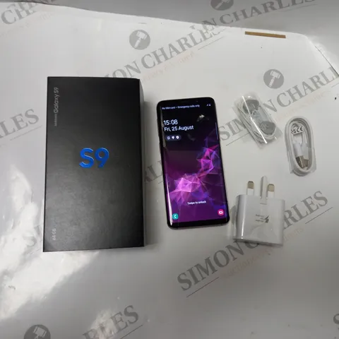 BOXED SAMSUNG GALAXY S9 IN METALLIC LILAC, WITH EARPHONES, POWER ADAPTER AND USB CABLE