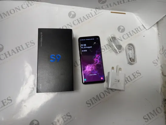 BOXED SAMSUNG GALAXY S9 IN METALLIC LILAC, WITH EARPHONES, POWER ADAPTER AND USB CABLE