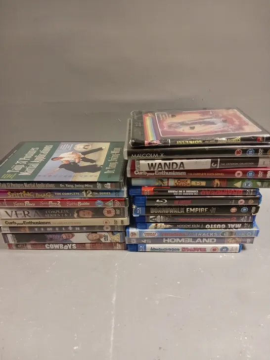 APPROXIMATELY 20 ASSORTED DVD/BLU-RAYS TO INCLUDE SPITTING IMAGE, TIMELINE, MALCOLM X ETC 