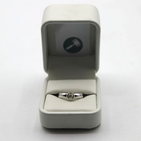 DESIGNER HEAVY 18ct WHITE GOLD SOLITAIRE RING SEMI RUB-OVER SET WITH A DIAMOND WEIGHING +-0.52ct