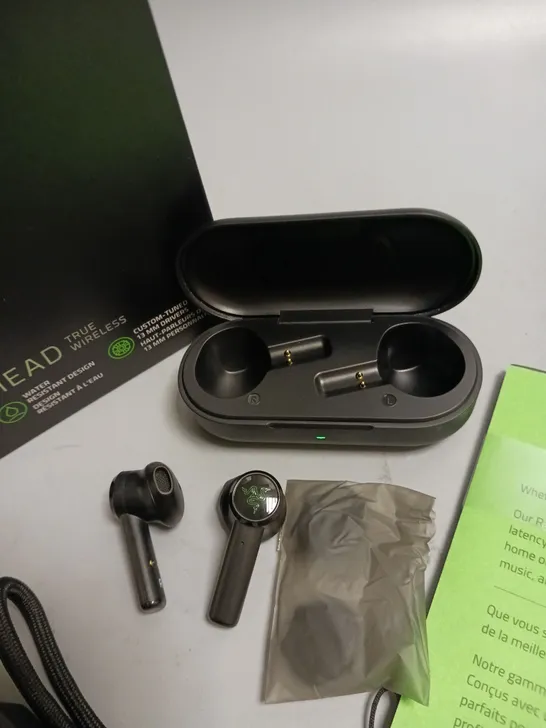 BOXED RAZER HAMMERHEAD TRUE WIRELESS HEADPHONES IN BLACK AND GREEN INCLUDES CHARGING CASE, CABLE, WRIST STRAP AND SPARE BUDS