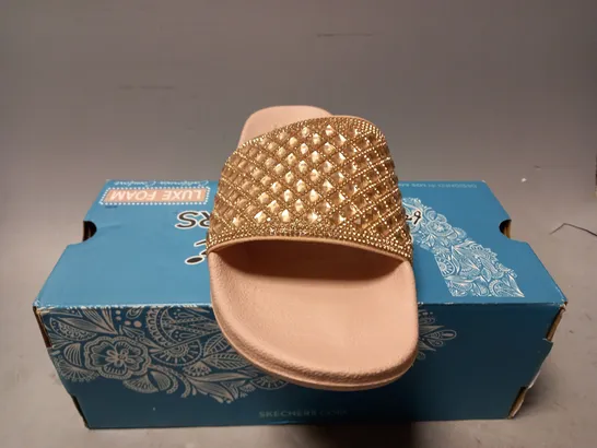 BOXED PAIR OF SKECHERS SANDALS IN ROSE GOLD SIZE 4