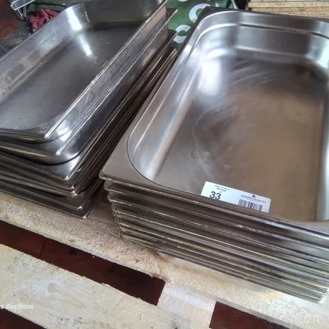 APPROXIMATELY 19 STAINLESS STEEL SERVING TRAYS